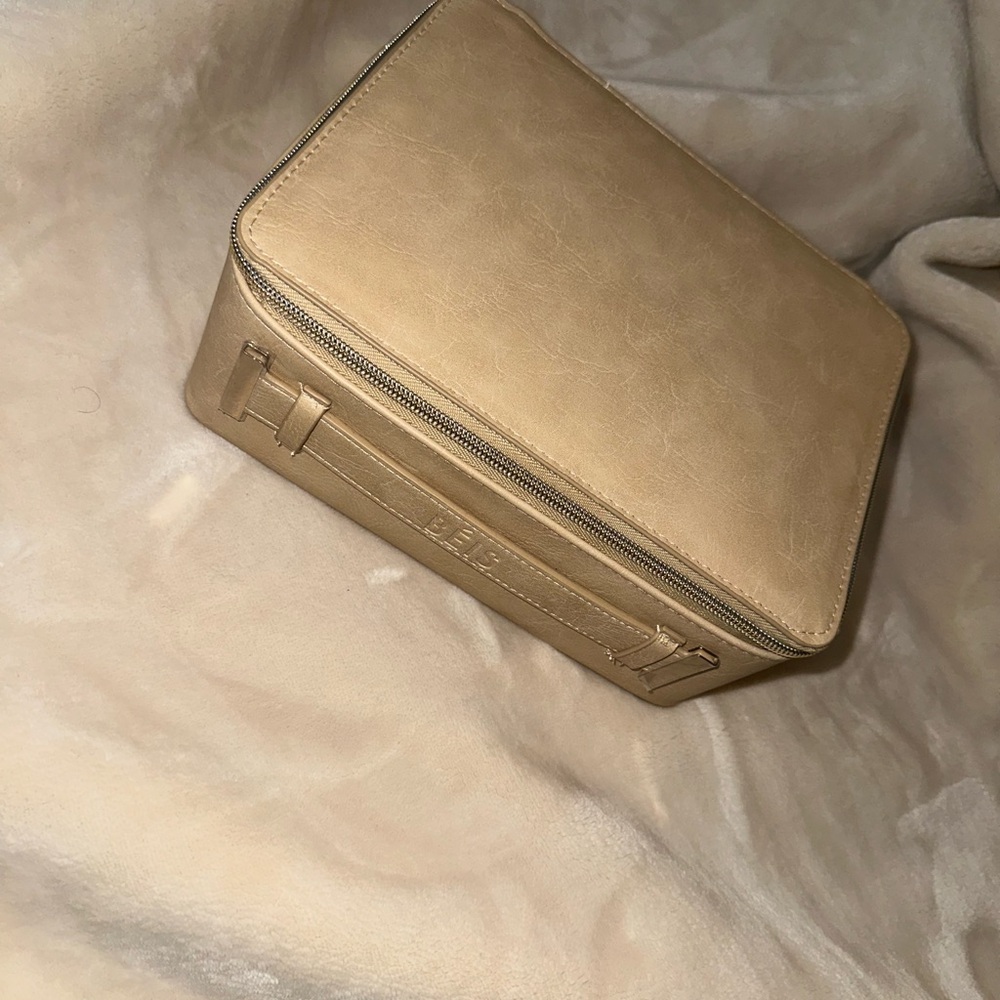 The cosmetic case in beige